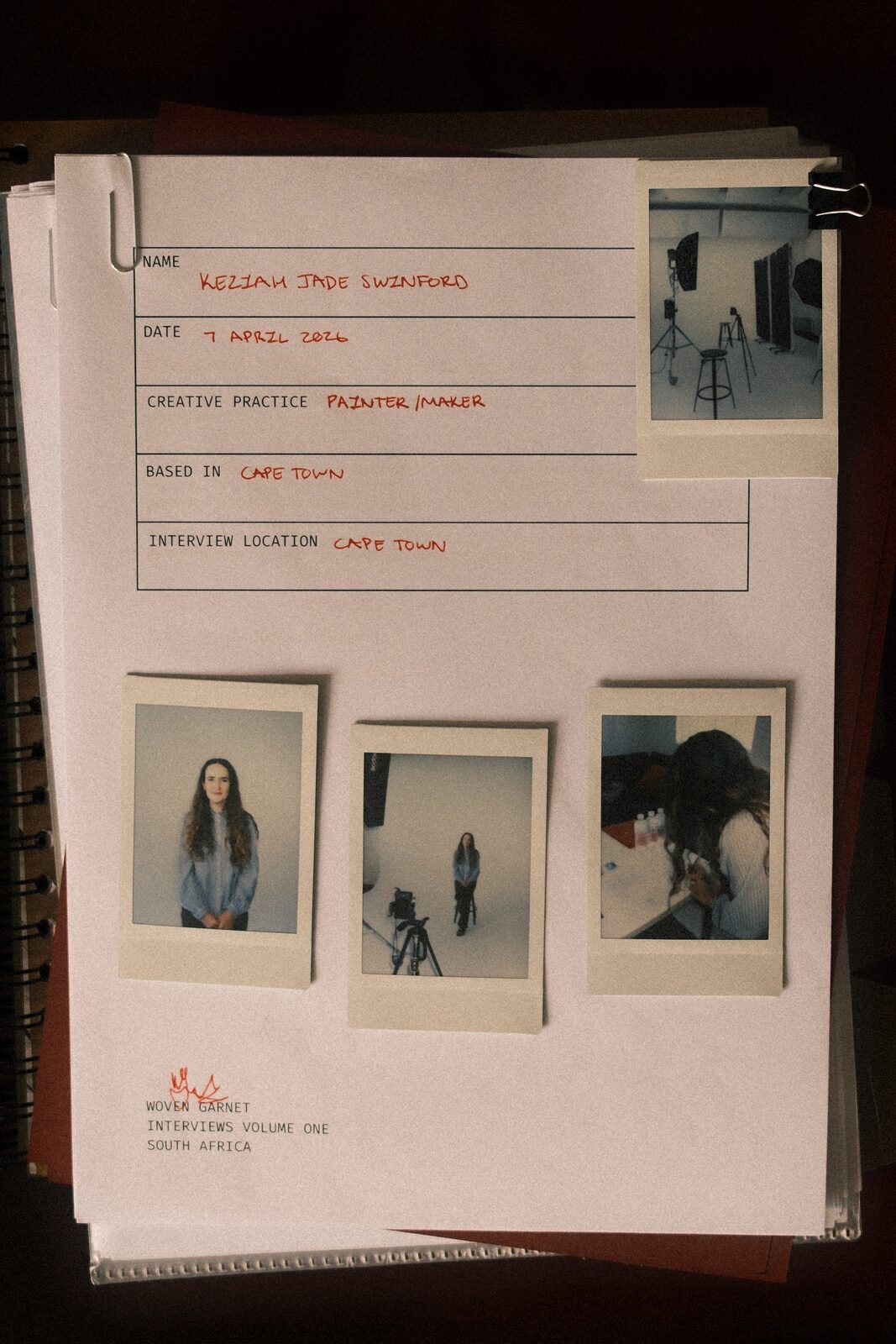 Keziah Jade Swinford's handwritten interview record card with polaroids